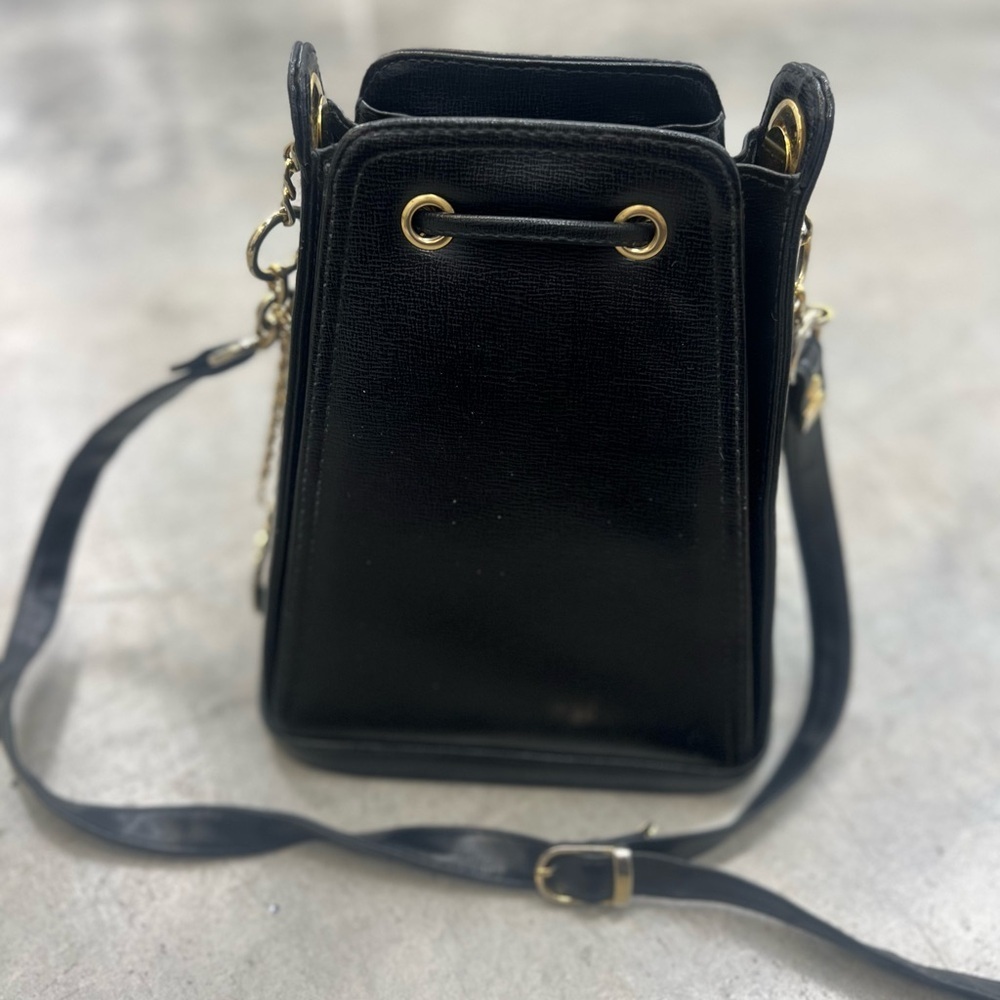 Small Black Crossbody Bag with Gold Accents and Drawstring Closure - Picture 6 of 11
